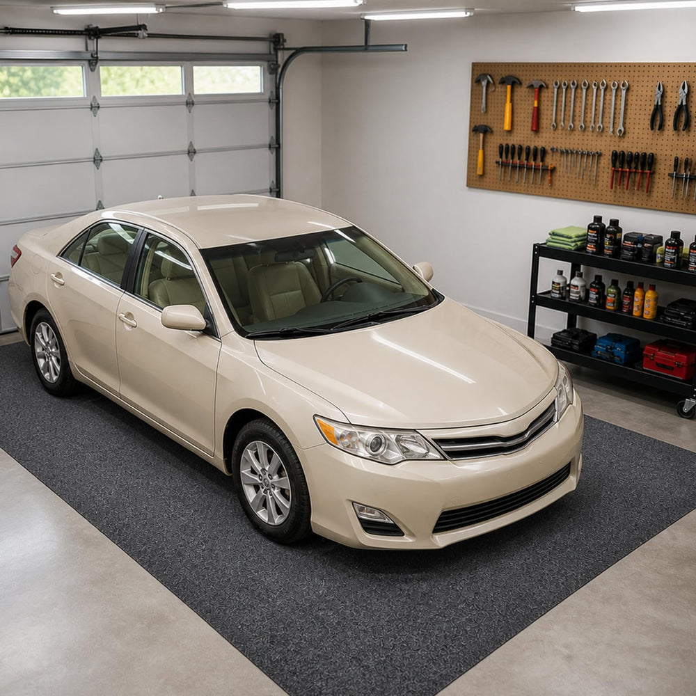 Grefinity front view of full mat protecting garage floor and reducing stains