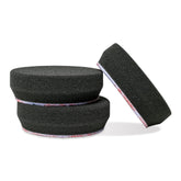 Griot's Garage front view of three black finishing pads showing uniform faces and gentle finish benefit
