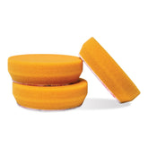 Griot's Garage orange pad front view showing secure hook-and-loop attachment and durable face