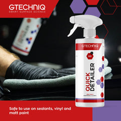 Gtechniq being wiped on glass to remove watermarks and restore clear visibility