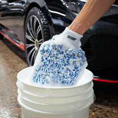 Gyeon mitt in hand showing true scale and secure fit advantage