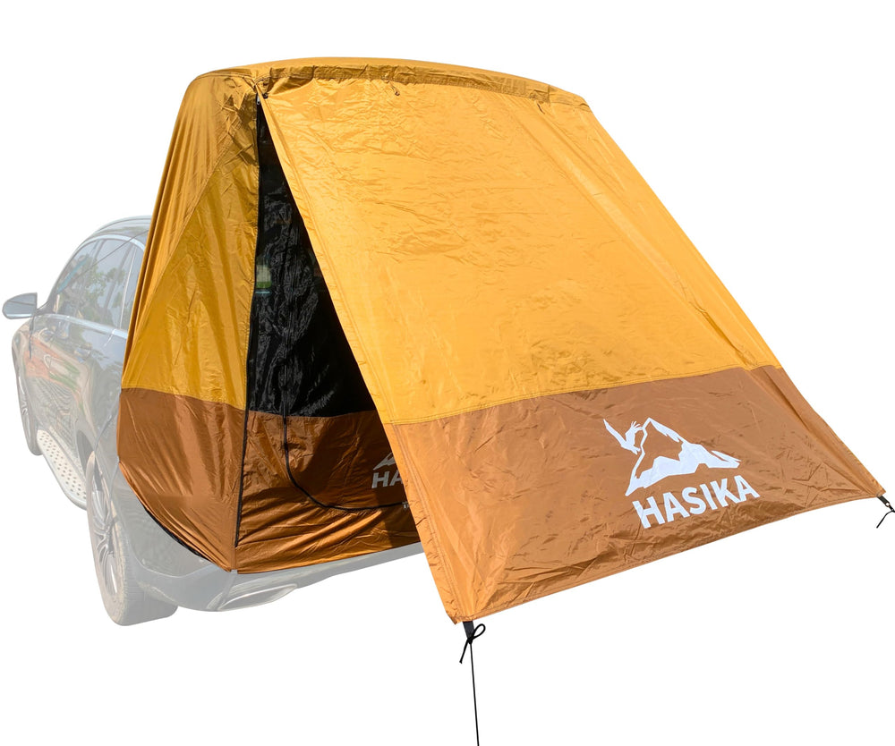 HASIKA front view showing tent attached to SUV and providing shaded area