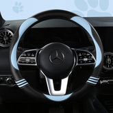 HighnessHwoo front view of blue cat steering cover showing cheerful design and grip benefit