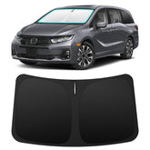INSAUTO front-view windshield shade fitted to Honda Odyssey showing full coverage and protection