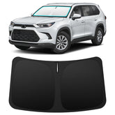 INSAUTO front view installed on Grand Highlander windshield showing full coverage and cooler cabin