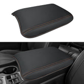 INTGET front view showing snug fit and orange stitch for protected armrest