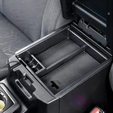 JDMCAR front view of organizer showing three compartments and tidy storage benefits
