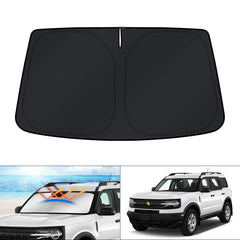 KUST front view showing custom-fit shade protecting windshield for cooler cabin