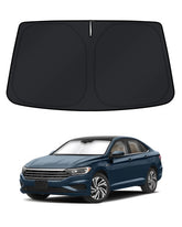 KUST front view of custom-fit Jetta windshield shade protecting interior