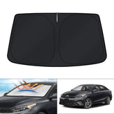 KUST sun shade full front fit on Kia Forte windshield showing perfect coverage and protection