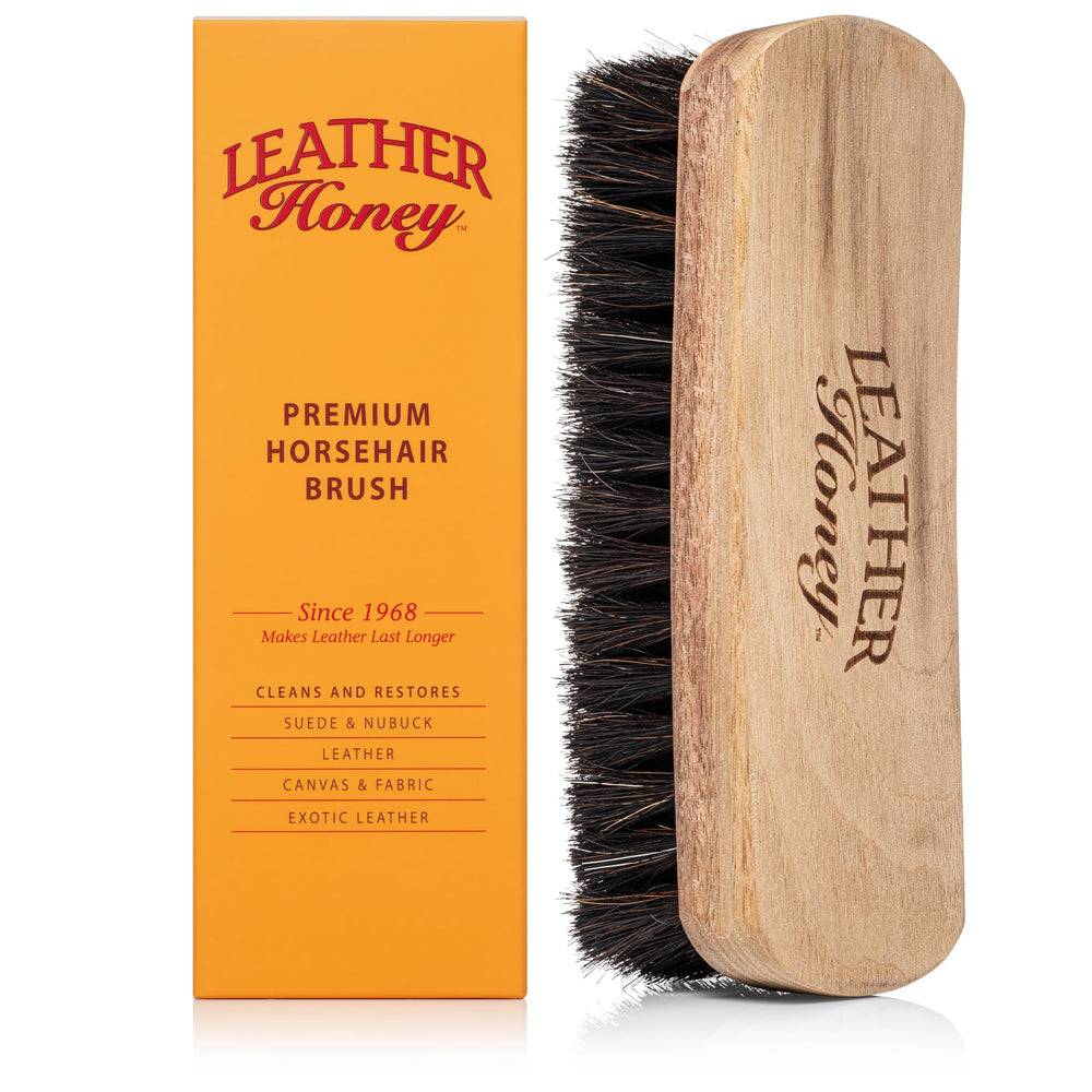 Leather Honey brush front view showing walnut handle and bristles for gentle cleaning