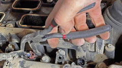 Lisle 37980 closeup of hooked tip engaging connector tab for precise release