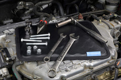 Lodesol magnetic surface holding sockets and wrenches securely in place