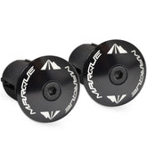 MARQUE front view of black alloy bar end plugs shows tidy finish and lightweight benefit