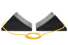 MAXXHAUL chock in use with RV demonstrating stable wheel support on pavement