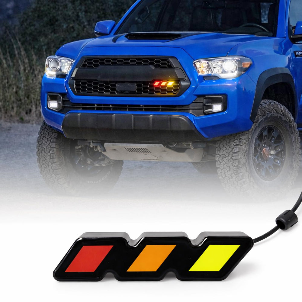 Medwoka front view installed on grille showing bold tri-color pop