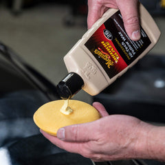 Meguiar's M26 applied with an applicator pad highlighting safe, even coverage benefits