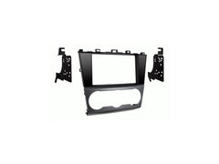 Metra 95-8907HG front panel installed showing gloss black finish and clean radio fit