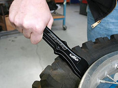 Motion Pro close-up of ergonomic handle and crossguard, secure grip benefit