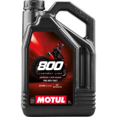 Motul bottle front view showing label and product benefits