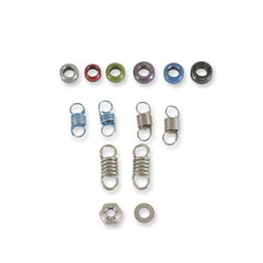 MSD spring and bushing next to a ruler illustrating exact fitment and scale for accurate installation