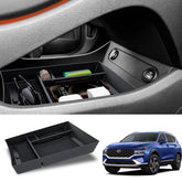 Neepiar front view of lower console tray showing compartments and organized storage benefit