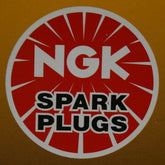 NGK spark plug 3932 front packaging showing brand and easy identification benefit