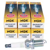 NGK 7090 pack front view showing branding and six-plug convenience benefit