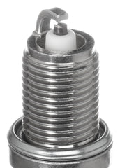 NGK spark plug beside ruler for scale showing correct reach and fitment benefit
