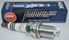 Close-up of NGK iridium center electrode showing fine tip for longer life and reliable spark