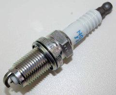 NGK spark plug installed in engine illustrating reliable ignition fit