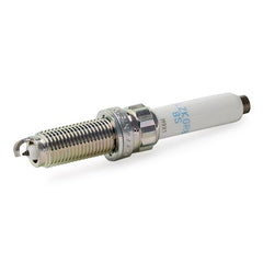 NGK spark plug installed in engine cylinder, demonstrating easy fit and performance