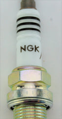 NGK side profile of spark plug showing insulator and durable construction