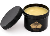Obenauf's heavy duty LP 8oz tin front view showing label and rugged packaging benefit