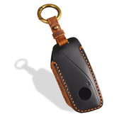 OLLEN front view of black leather key fob cover shows sleek protection