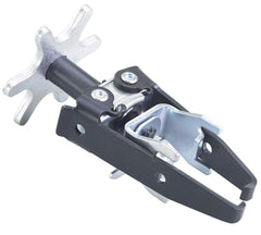 OTC 4573 front-angle showing tool and adapters, offering stable valve spring compression