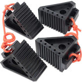 OULEME front view of four rubber wheel chocks showing size and rugged build for secure parking