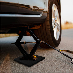 OULEME pad placed under an RV jack demonstrating improved traction and safety