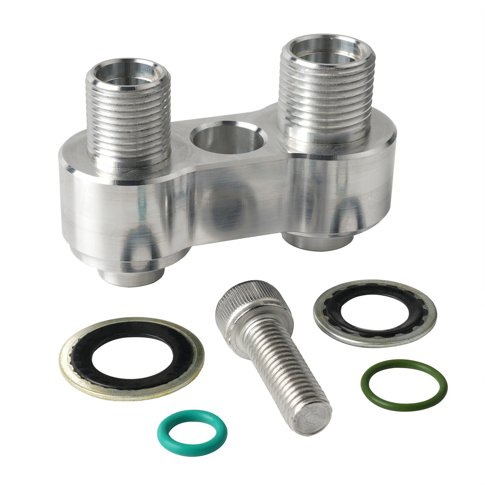 Outopakkle adapter front view showing ports and clean CNC finish for reliable sealing