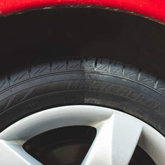 P&S Shine All tire before and after showing restored deep black shine