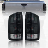 PAANLOK smoked tail housings front view showing sleek sealed fitment benefit
