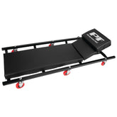 Performance Tool front view of creeper showing full deck and headrest, comfortable support