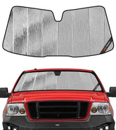 Pigenius AstraGuard front view installed showing full windshield coverage and heat reduction