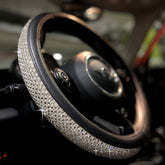 PINCTROT steering wheel cover front view showing silver rhinestones and PU leather for glam styling