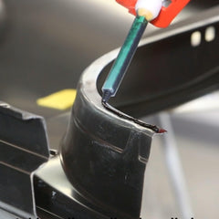 Polymix adhesive extruding through nozzle showing consistent bead control benefit