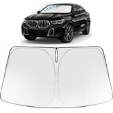 Proadsy front view of shade on BMW X6 windshield showing full coverage and heat reflection