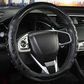 QCYP steering wheel cover front view showing sleek black finish and sporty accents for improved style
