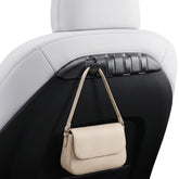 REEVAA front view installed on Tesla seat back shows neat storage benefit
