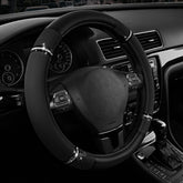 Road Comforts front view of black steering wheel cover showing sleek fit and finish