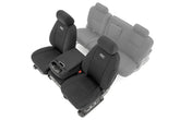 Rough Country installed front seat covers showing snug fit and restored interior
